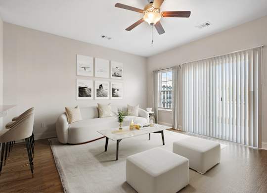 Omnia at Richmond Hill Townhomes in Georgia photo of living room with hardwood floors and ceiling fan