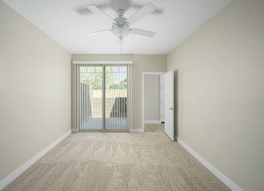 A room with a carpeted floor and a ceiling fan.