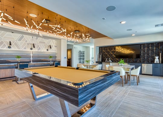 South Scottsdale Apartments - Lucent Scottsdale - Clubhouse with kitchen, dining tables and billiards table