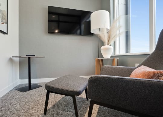 a living room with a couch and a chair