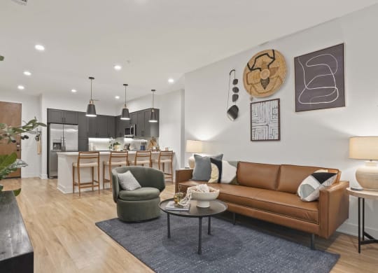 a living room with a couch and a table