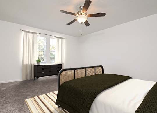 A bedroom with a bed, dresser, and window.