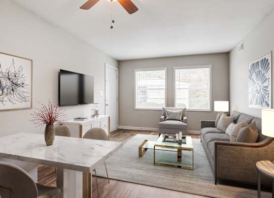 Spacious living room with large windows at Brookview apartments in Douglasville, Georgia near Atlanta-Sandy Springs-Roswell metro area