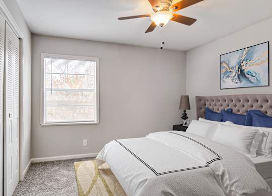 “Bright bedroom featuring a large window at Brookview apartment community near Atlanta-Sandy Springs-Roswell in Douglasville, GA