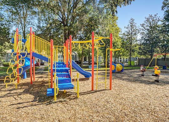 Outdoor playground area at Chelsea Apartments in Gainesville, Florida