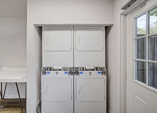 On-site laundry facilities at Chelsea Apartments in Gainesville, Florida
