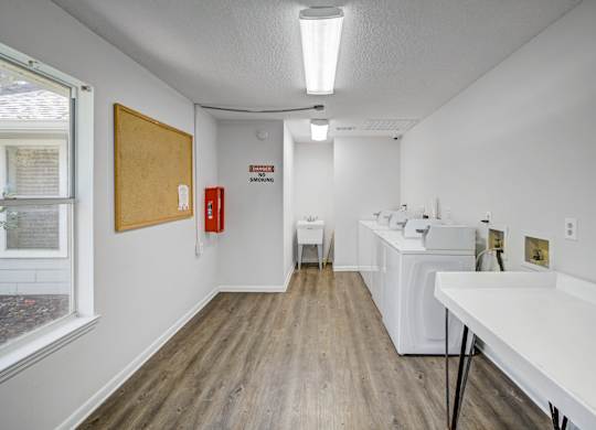 On-site laundry facilities at Chelsea Apartments in Gainesville, Florida