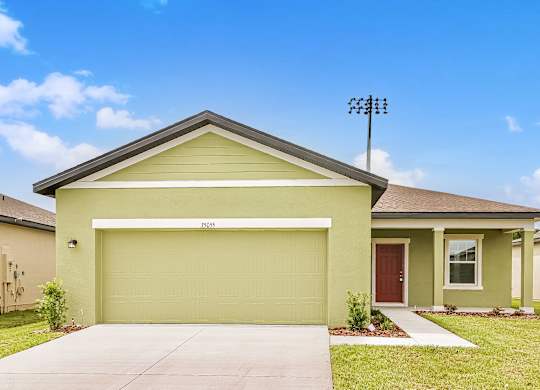 A house with a garage door that says