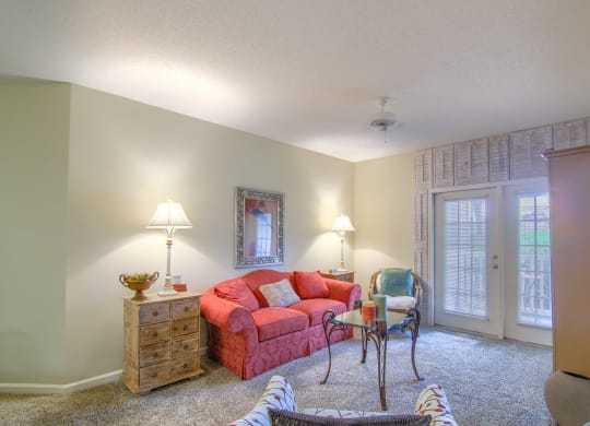 Enclave at Wolfchase Apartments in Cordova Tennessee photo of a living room with a couch and a table