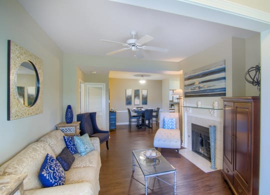 Enclave at Wolfchase Apartments in Cordova Tennessee photo of a living room filled with furniture and a fireplace