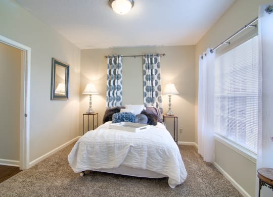 Enclave at Wolfchase Apartments in Cordova Tennessee photo of bedroom with plush carpeting