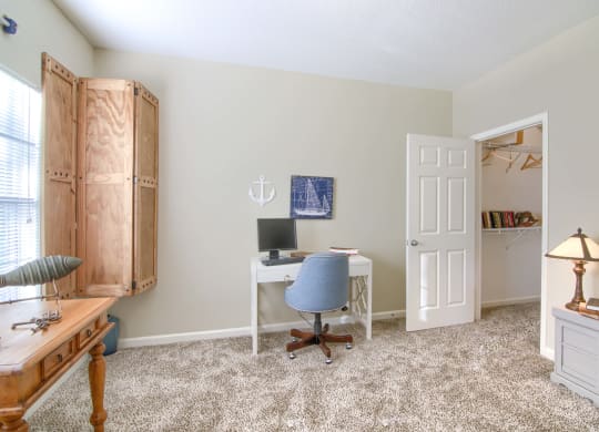 Enclave at Wolfchase Apartments in Cordova Tennessee photo of a home office with a desk and computer