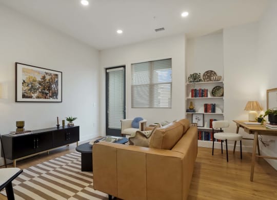 a living room with a couch and a table