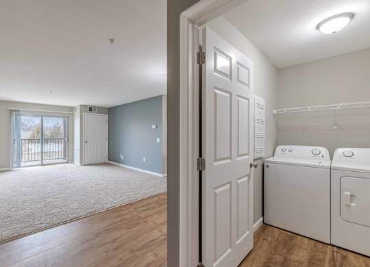 A laundry room with a washer and dryer.