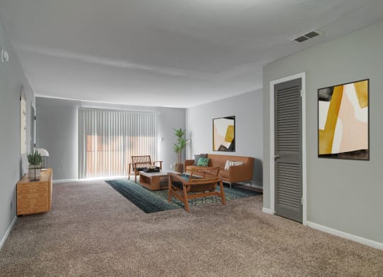 Estuary Apartments in Atlanta Georgia 30341 photo of a living room with gray walls and a carpeted floor