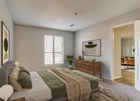 a bedroom with a bed and a dresser and a window