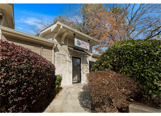 Exterior of the clothes care center at Springdale Glen, a pet-friendly community in Clarkston, GA, near Decatur.