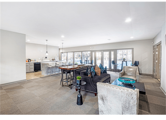 Clubroom with comfortable seating and modern décor at Springdale Glen, a pet-friendly community in Clarkston, GA, near Decatur.