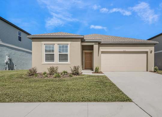 A house with a brown garage door and a brown front door.