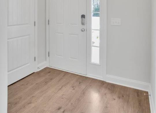 Harris Trail Luxury Townhomes for rent Richmond Hill, GA photo of entry with smart lock