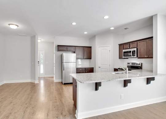 Harris Trail Luxury Townhomes for rent Richmond Hill, GA photo of kitchen with stainless steel appliances