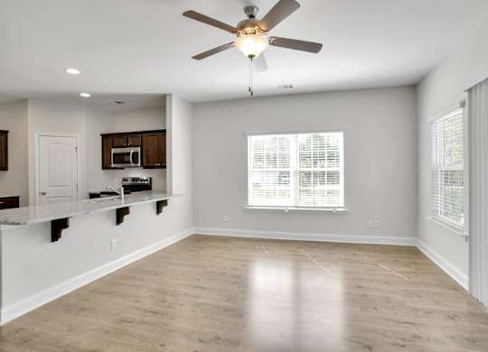 Harris Trail Luxury Townhomes for rent Richmond Hill, GA photo of living room with large window