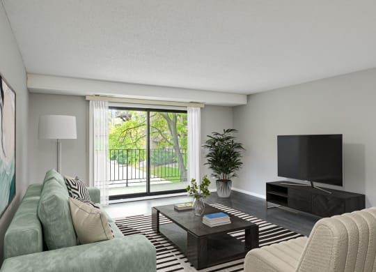 Laurel West End Apartments in Golden Valley, MN photo of a living room with a large window and a sliding glass door