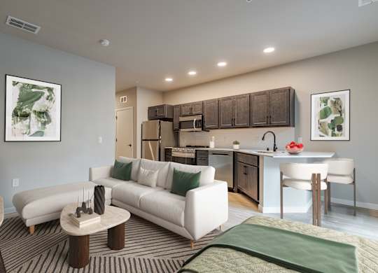 A modern living room with a white sofa and a coffee table.