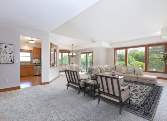 Laurel East End Apartments in Golden Valley, MN photo of a living room with a couch and a table and chairs