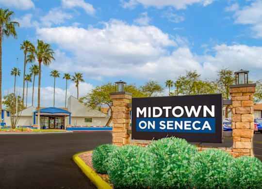 Property sign for Midtown on Seneca, a pet-friendly apartment community near East Central Tucson, Tucson, AZ.