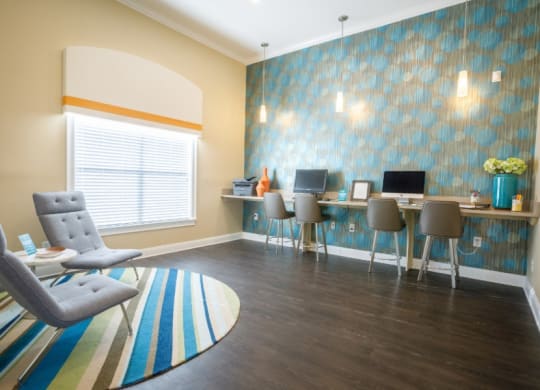The Asher at Sugarloaf apartments in Lawrenceville Georgia photo of business center
