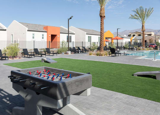 Outdoor game and lounge area at Alowyn Homes Centennial North Las Vegas