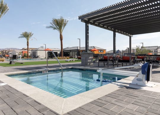 Outdoor shaded lounge and pool area in North Las Vegas homes for rent