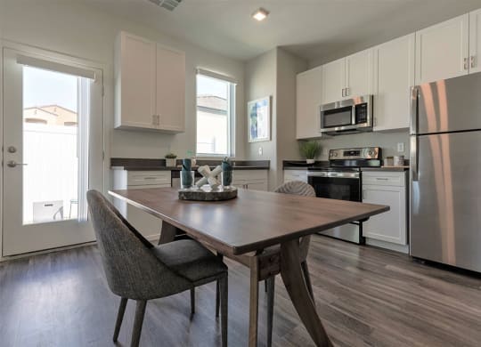 Open-concept dining and kitchen in North Las Vegas home for rent