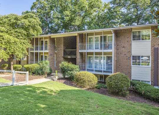 Front view of apartment building at Grand Arbor Reserve Apartments in Raleigh, NC 27607, near Central Raleigh.