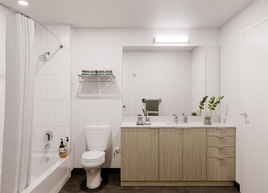 a bathroom with a toilet sink and bathtub