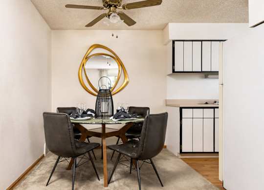 Dining space inside a classic apartment at Trailgrove Apartments near the Denver Tech Center.