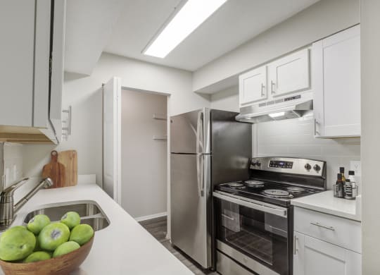 the timbers raleigh nc apartments for rent kitchen with stainless steel appliances and white cabinets with stone counter tops and pantry