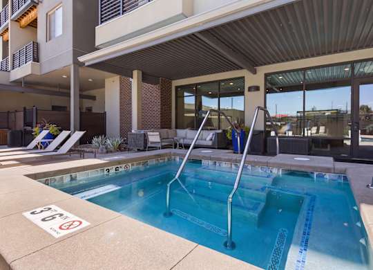 A pool with a no swimming sign on the ground.