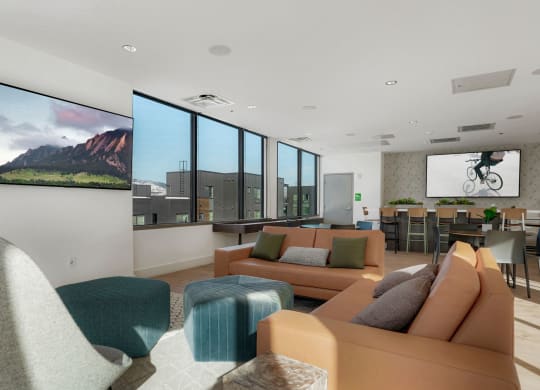 a living room with couches and chairs and a large screen tv on the wall