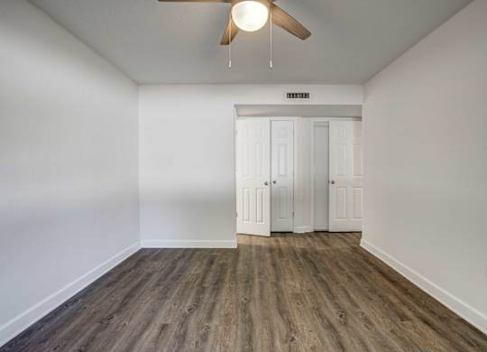 Spacious area with hardwood floors at Square One Apartments in Gainesville FL