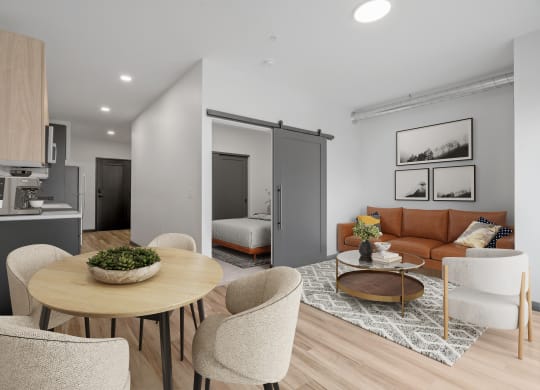 a living room with a couch and a table
