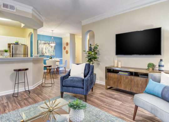 Open-concept living room with modern design at Grande Club apartments in Duluth, GA 30096, near Lawrenceville.