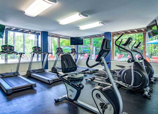 Fully equipped on-site fitness center featuring treadmills, ellipticals, strength machines, and free weights—offering Marietta renters a convenient alternative to a gym membership.
