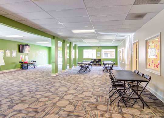 Free on-site child care room with toys, learning materials, and kid-friendly décor at Stratford Ridge Apartments in Marietta, GA—offering added convenience for families.