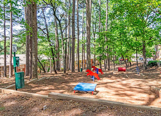Fenced pet park at Stratford Ridge, a pet-friendly community in Marietta, GA, near Smyrna, providing a safe and open space for pets to play.