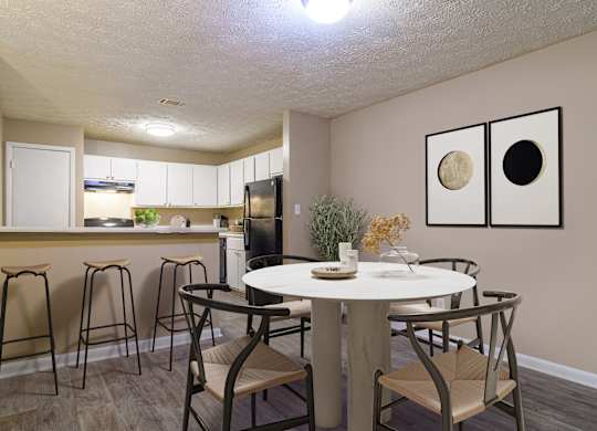 Spacious Dining room adjacent to the kitchen at Stratford Ridge, a pet-friendly community in Marietta, GA, near Smyrna
