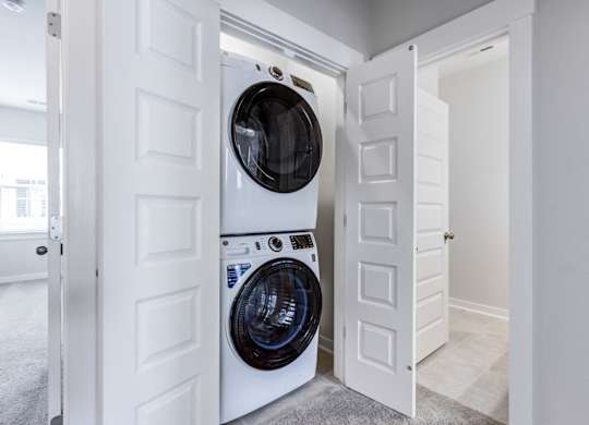 Charleston, SC Apartments- Sumner Village - Laundry Room with Stackable In-Unit Washer and Dryer