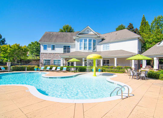 The Asher at Sugarloaf apartments in Lawrenceville Georgia photo of resort style pool.