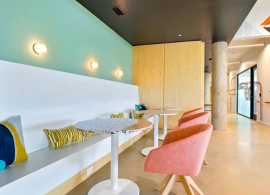 a room with a table and chairs